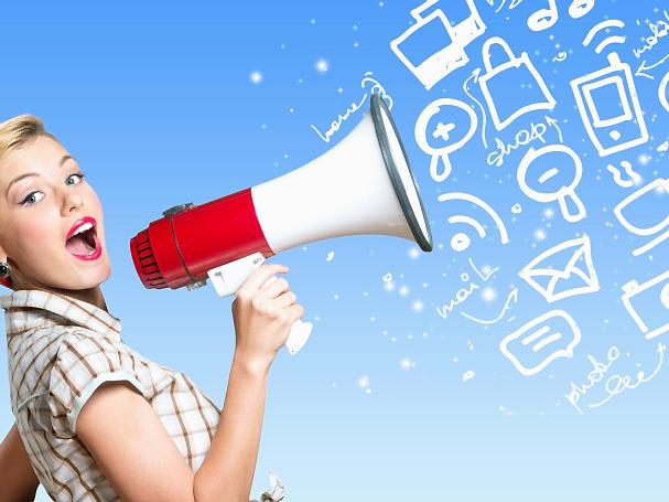 Retro style woman holding megaphone